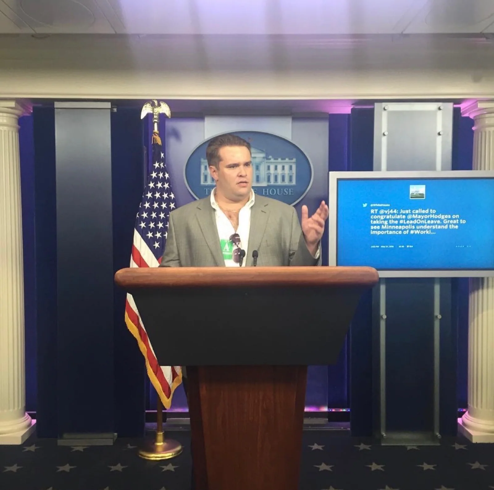 Jon speaking at the podium in the White House press briefing room